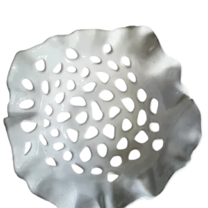 white glossy ceramic bowl with holes